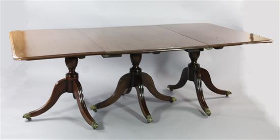 An early 19th century mahogany triple pillar extending dining table, L.7ft 7in. H.2ft 4.5in.